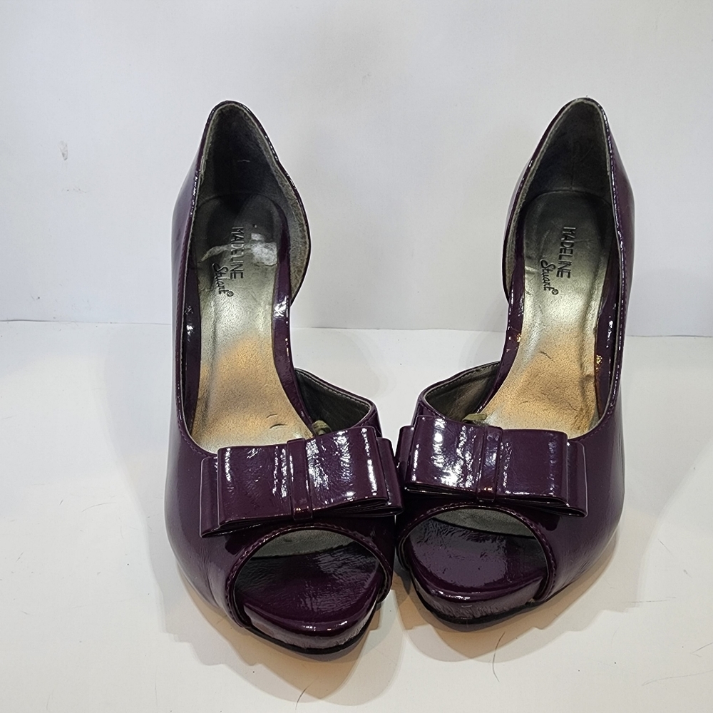 Purple open toe heels with bow